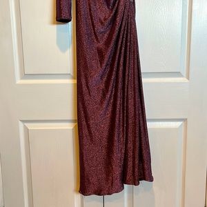 One shoulder evening gown with split. Worn one time